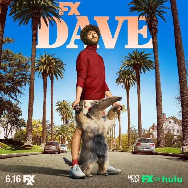 Promotional poster for FX's Dave, season 3. Man in red turtleneck holds an anteater on a sunny street with palm trees and blue sky.