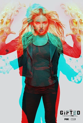 Blonde-haired woman poses in a promotional poster for the series 'The Gifted,' wearing a black jacket and leggings against a light background.