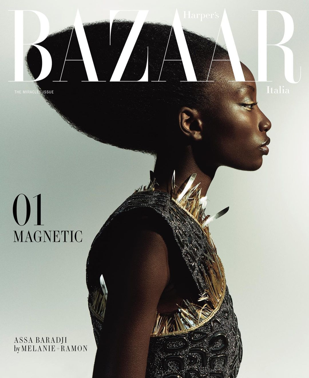 Harper's Bazaar Italia cover featuring a Black woman with dark hair and an embellished collar, close-up shot, studio lighting.