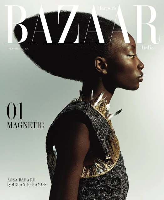 Harper's Bazaar Italia cover featuring a Black woman with dark hair and an embellished collar, close-up shot, studio lighting.