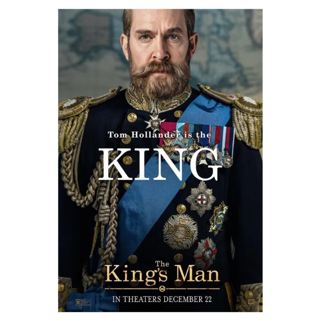 Movie poster for The King's Man featuring Tom Hollander in military attire with medals and intricate gold braiding on a map background.