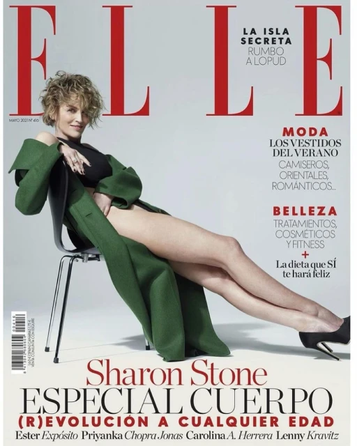 Sharon Stone poses in a green coat and heels on the cover of Elle magazine. The cover features headlines about fashion and beauty.