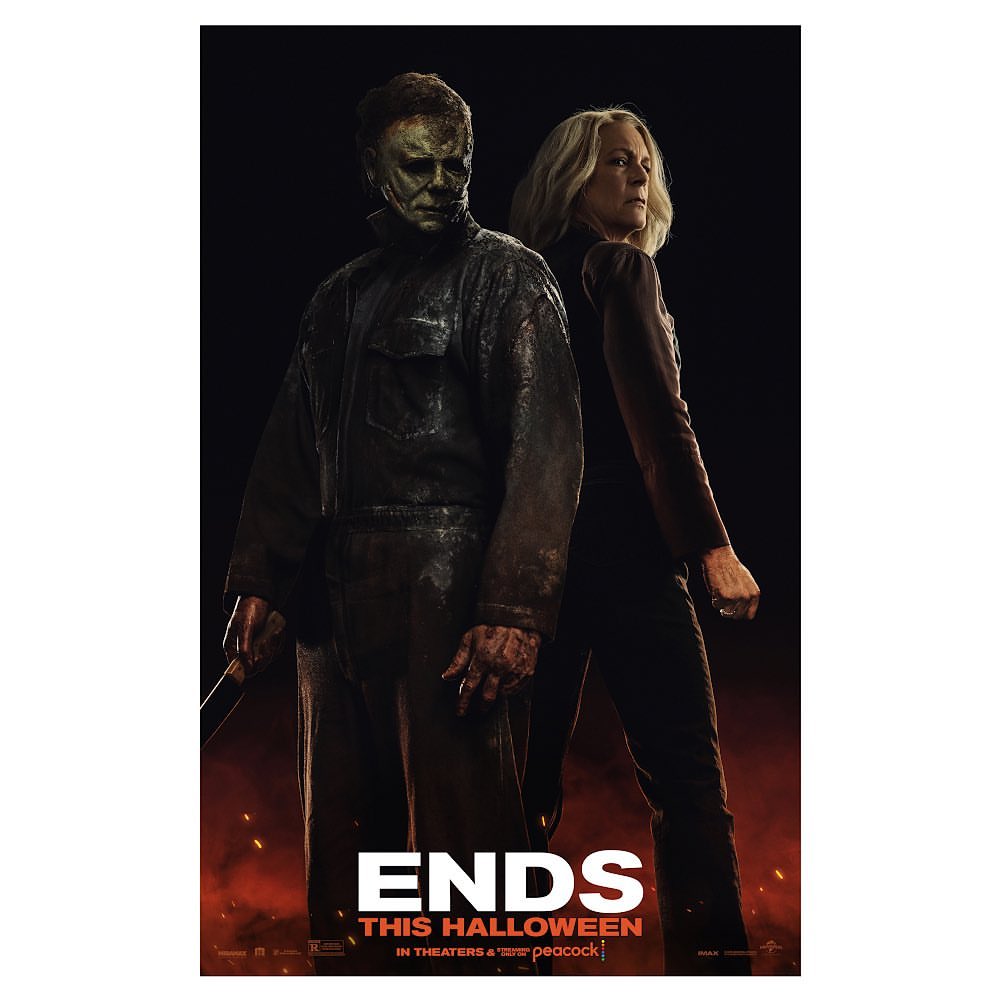 Movie poster for 'Halloween Ends' featuring Michael Myers with mask and Laurie Strode in a dark, fiery cinematic scene.