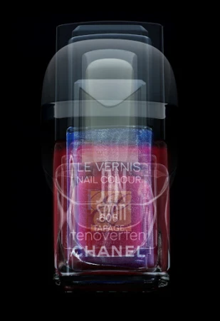A multiple exposure photograph of a nail polish bottle layered against a solid black background.