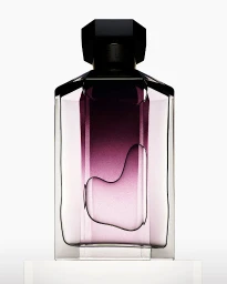 A luxury perfume bottle with a dark faceted cap and a gradient purple glass body standing on a white pedestal.