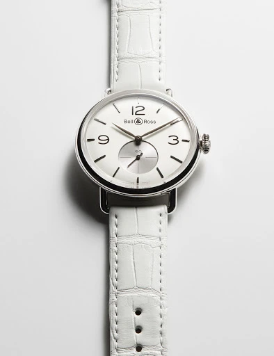Silver Ball & Ross wristwatch with white crocodile leather strap on a white surface, showcasing luxury timekeeping with Swiss craftsmanship.