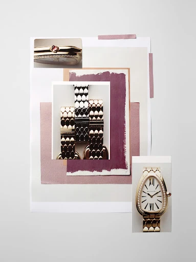 Still life of gold bracelets and a watch on layered paper, creating an elegant and textured composition with neutral and pastel tones.