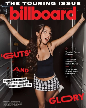 Olivia Rodrigo on Billboard Magazine cover, promoting Guts album, wearing black tank top and polka dot skirt, arms raised, red text.