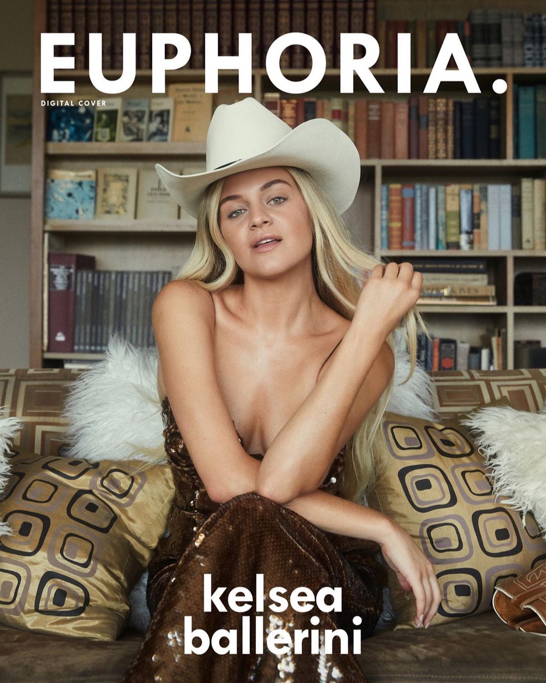 Euphoria magazine cover featuring Kelsea Ballerini wearing a cowboy hat and sparkly dress, posing in front of a bookshelf.
