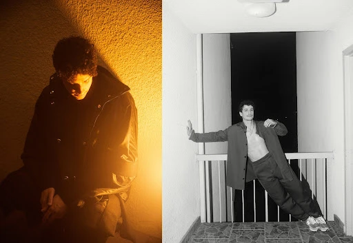 Split-screen fashion shot: Man in dark coat against warm wall; man in coat leans on railing against dark backdrop, captured indoors.