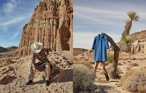 Fashion photography in a desert landscape. One figure in a hat sits on a rock; a dress on legs stands beside a yucca tree.