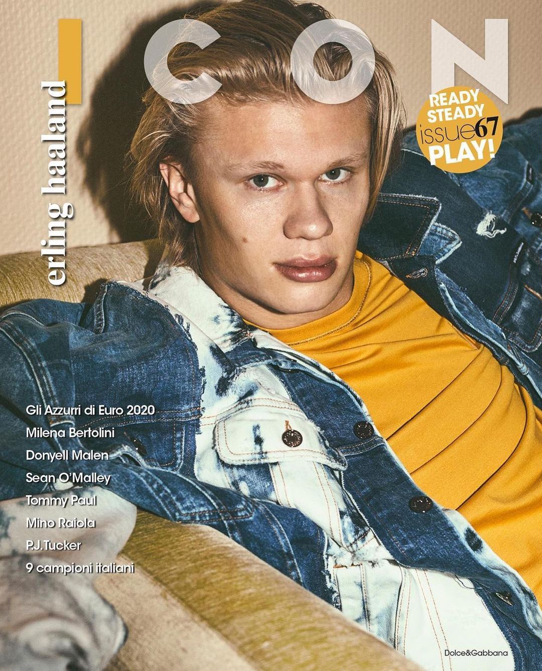 Magazine cover featuring Erling Haaland in a blue and white denim jacket over a mustard yellow shirt, set against a neutral background.