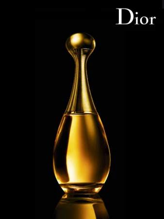 A teardrop-shaped gold perfume bottle with a long slender neck against a black background with reflection.