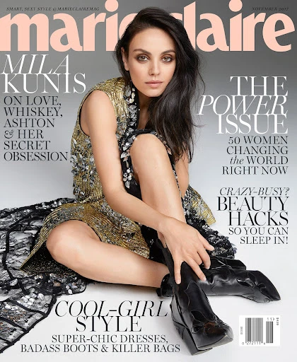 Mila Kunis graces a Marie Claire cover in a gold-toned, embellished dress and black boots, posing in front of a neutral backdrop.