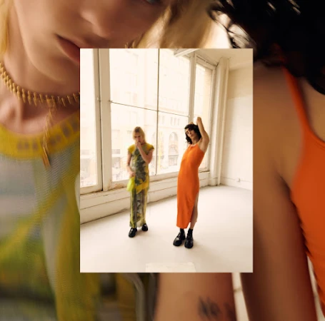 Collaged fashion photograph featuring two models standing by a large window with cropped portrait details framing the edges.