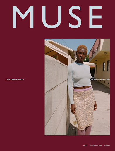 Magazine cover featuring Jodie Turner-Smith in an urban setting, styled in a sparkly skirt, against a backdrop of cream and burgundy hues.