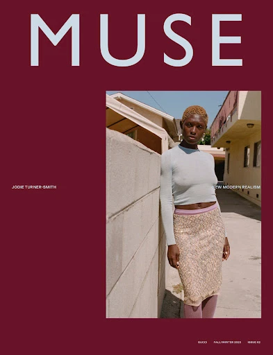 Magazine cover featuring Jodie Turner-Smith in an urban setting, styled in a sparkly skirt, against a backdrop of cream and burgundy hues.