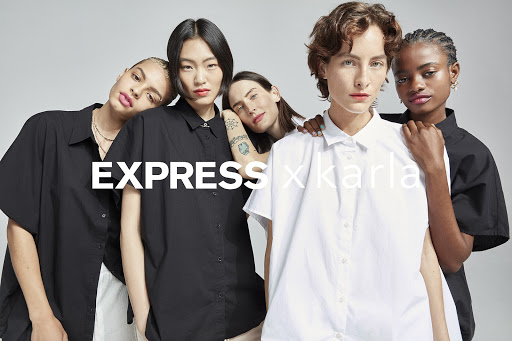 Five fashion models in a close studio shot wearing black and white shirts. Text overlay: EXPRESS x karla. Cool lighting.