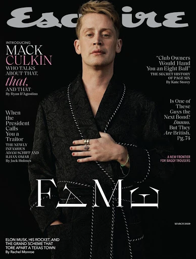 Esquire magazine cover featuring Macaulay Culkin in a patterned robe against a dark backdrop with bold typography, promoting an article about 'Fame'.