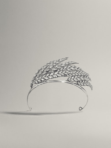 Elegant diamond tiara featuring a wheat design, set against a neutral background, emphasizing luxury and craftsmanship for editorial use.