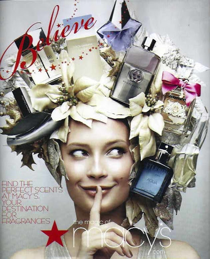 Cosmetics ad: woman with head adorned with silver floral accents and perfume bottles; close-up shot with soft lighting.