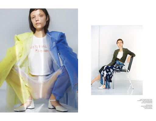 Two stylish women models in contemporary fashion outfits featuring blazers, skirts, tops, and shoes in a bright studio setting.