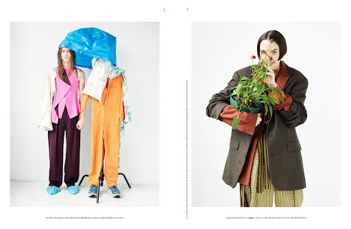 Two fashion models pose in a photo studio wearing designer clothes with an emphasis on unconventional styling and creative direction.