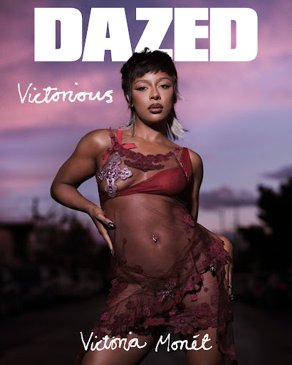 Magazine cover featuring Victoria Monet in a sheer, burgundy outfit against a soft sunset backdrop, promoting 'Dazed' and her latest work.