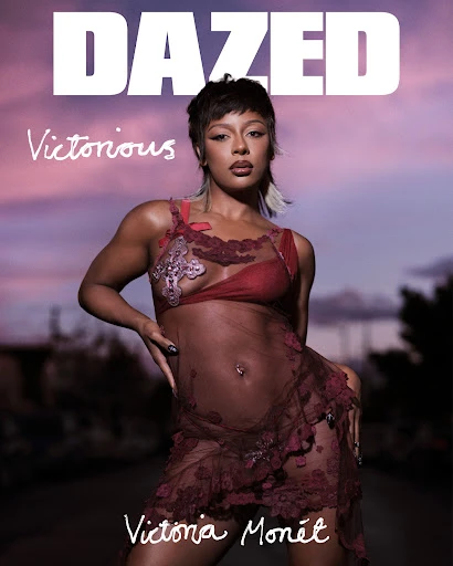 Magazine cover featuring Victoria Monet in a sheer, burgundy outfit against a soft sunset backdrop, promoting 'Dazed' and her latest work.