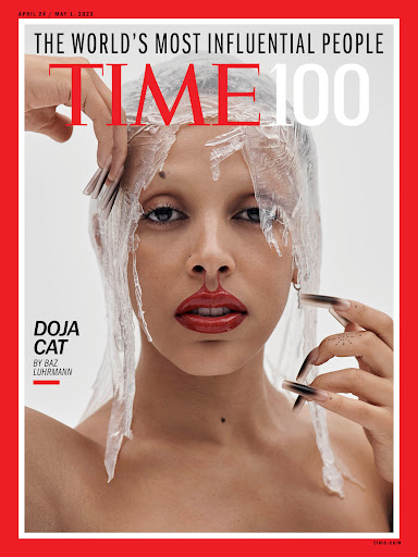 Doja Cat cover portrait for Time Magazine, shown with see-through plastic wrap partially covering her head and long painted fingernails.