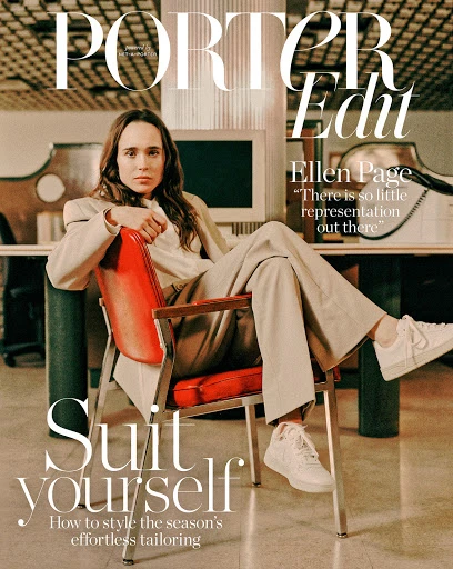 Magazine cover featuring a woman in a suit sitting in a chair, with magazine text and branding visible. Fashion editorial, portrait.
