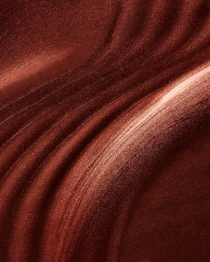 Abstract image featuring an array of swirling shapes and patterns in dark brown, copper, and light tan tones, creating a dynamic surface texture.