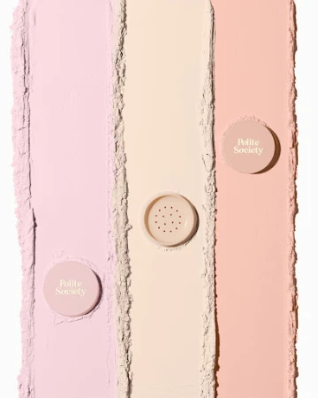 Three shades of cosmetic powder foundation are displayed in vertical columns, with a Polite Society container on each.