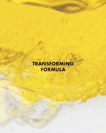 Viscous yellow liquid swirling with white translucent substance, evoking texture and movement, branded with “Transforming Formula” text.