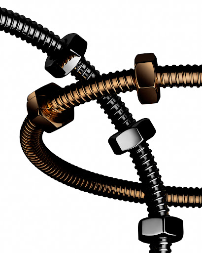 Abstract product shot featuring interlaced, shiny metal bolts and nuts on a bright white backdrop. Industrial and mechanical themes.
