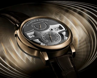Close-up product photograph of a luxury mechanical watch with a dark dial and brown leather strap against a swirling abstract light background.