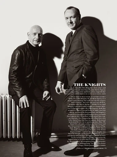 Black and white portrait of actors Ben Kingsley and Kevin Spacey in suits posing together in front of a white background with script.