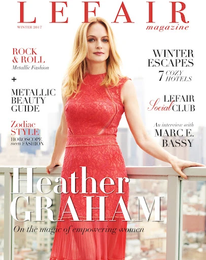 Magazine cover featuring Heather Graham in a red lace dress, standing on a balcony with a cityscape in the background, Lefair Magazine.