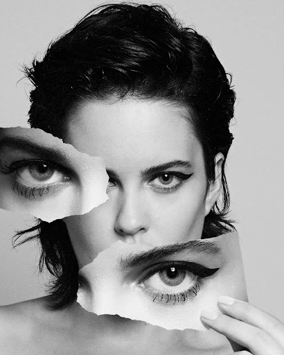 Striking black and white portrait of a woman with short hair, featuring an artistic collage of facial features and minimalist makeup.