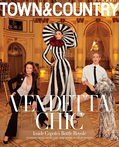Town & Country magazine cover with three women in stylish dresses. One woman in a black suit, another in black and white stripes, and one in white.