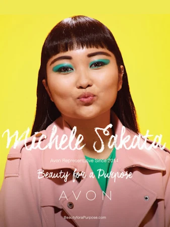 Portrait of a woman with teal eyeshadow wearing a pink trench coat against a bright yellow background, promoting a beauty brand.