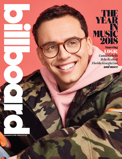 Billboard cover featuring Logic, with copy "The Year in Music 2018" in a studio headshot with camo jacket and pink hooded sweatshirt.