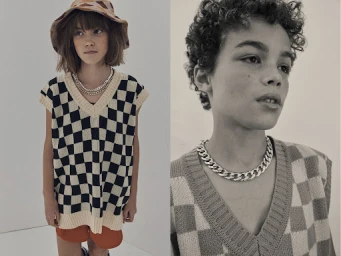 Two fashion portraits featuring young models wearing checkerboard knit vests and chunky silver chain necklaces.