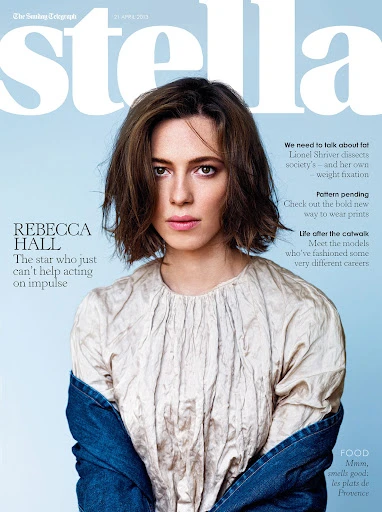 Magazine cover featuring Rebecca Hall in a textured blouse and denim jacket against a light blue background with bold 'stella' masthead.