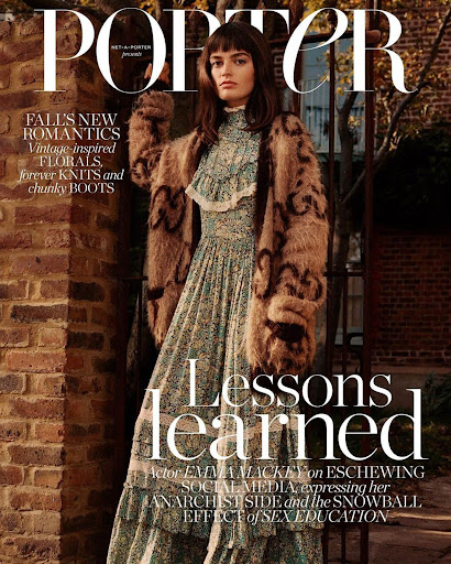Emma Mackey on the cover of PORTER magazine wearing a floral dress and fur coat, posing against a brick and greenery background.