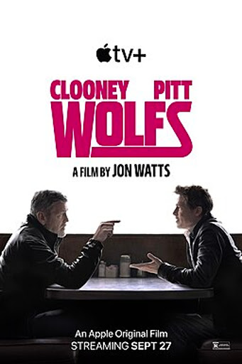 Movie poster for "Wolves" starring Clooney and Pitt, depicting two adult males sitting at a table in an indoor setting.