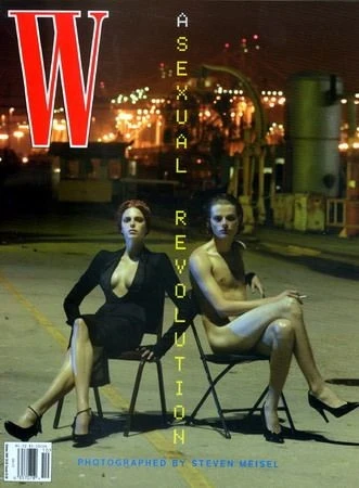 Magazine cover featuring two models sitting on chairs outdoors at night, with a large 'W' logo and the words 'A Sexual Revolution'.