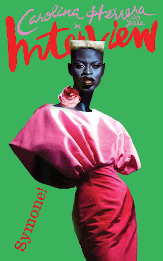 Grace Jones on magazine cover, wearing a vibrant pink dress against a bright green background, promoting Carolina Herrera and Interview magazine.