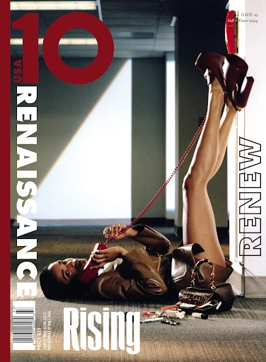 Fashion magazine cover with a woman lying on the floor using a red telephone and wearing high heels, with makeup scattered around.