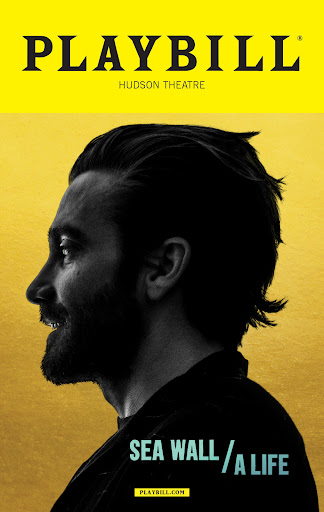 Promotional image for 'Sea Wall/A Life' play at Hudson Theatre. Headshot profile of Jake Gyllenhaal over a yellow background with play title text.